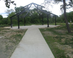 Concrete Walkway leading to Picnic Pavilion at Birchwood Community Center